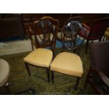 An elegant pair of Mahogany framed Side Chairs having turned and lobed front legs,