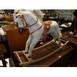 A white rocking horse