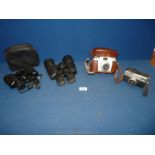 Two cased pairs of binoculars including Hanimex 8 x 30 and Zennox together with two cameras,