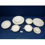 A quantity of Wedgwood Queens ware cream coloured items including three soup bowls and two fruit