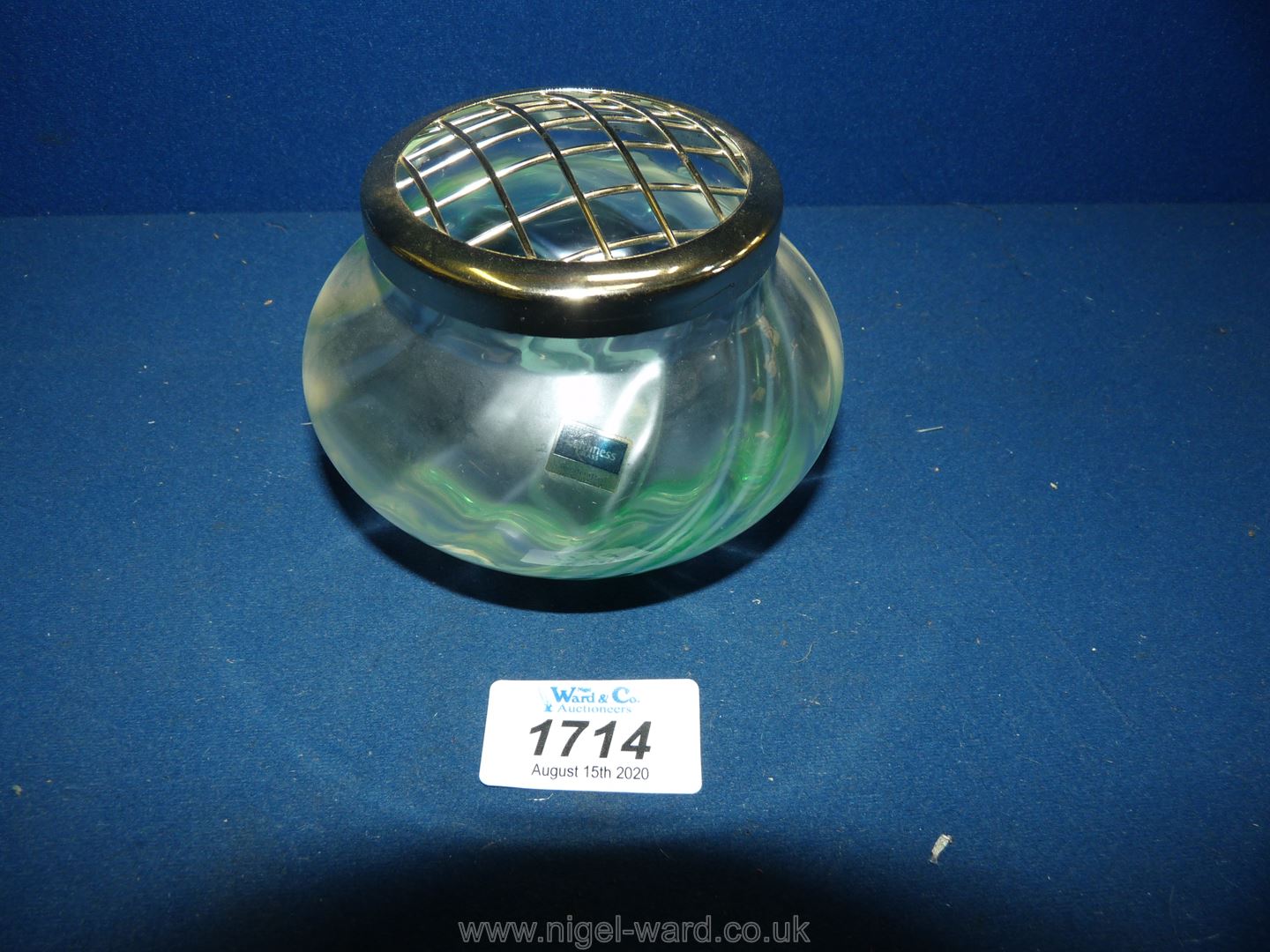 A small Caithness rose bowl in pale green vaseline glass with darker stripes of green to the base.