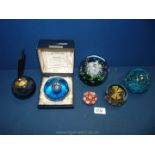 Six glass paperweights including small miliefiori, limited edition Caitnhess space traveller,