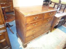 An early 19th century Mahogany Chest of 3 long and 2 short drawers having swan-neck drop handles