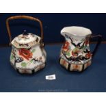 A Losol Ware Shanghi Bird of Paradise container with lid and handle (7") and octagonal jug.