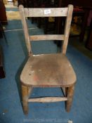 An appealing child's side/school Chair with Elm seat.