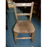 An appealing child's side/school Chair with Elm seat.