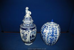 Two blue and white Ginger Jars, one by Delft with dog finial to lid,