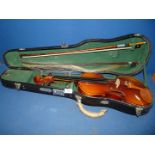 A Skylark violin in case, 23" long with two bows, one in good condition the other a/f.