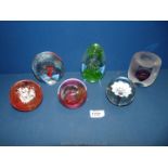 Six paperweights including Svaya, Caithness, etc.