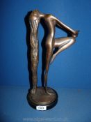 A bronzed lady candle holder, 14" tall.