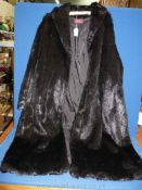 A French acrylic Crealine de Daxon black long Jacket, UK size 32"/34" .
