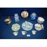 A small quantity of oriental china including two miniature tea sets, blue vase with white blossoms,