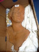 A heavy terracotta Bust of a young girl, 19'' tall,