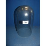 A plastic/ glass dome, height 10".