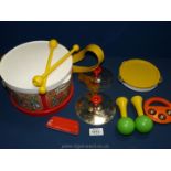 A Fisher Price drum set.