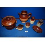 A small quantity of stoneware including jugs, pots and casserole dish.