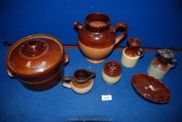 A small quantity of stoneware including jugs, pots and casserole dish.