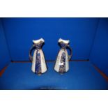 Two Victorian Jugs in royal blue and gold with floral decorated panels, a/f (rubbing to gilding,