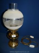 A brass Oil Lamp converted to electric with etched and frosted glass shade, 19'' tall overall.