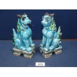 A pair of Chinese dragons, turquoise.