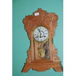 A carved Clock by New Haven clock Co.