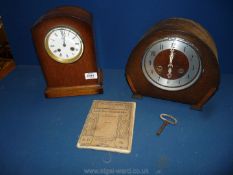 Two mantle Clocks, one dome shaped having Arabic numerals by Smiths Enfield with key, 9'' tall,
