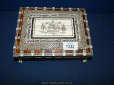 A Victorian Vizagapatam Tortoiseshell and Ivory casket mounted on paw feet, 8'' wide.