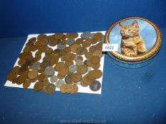 A tin of pre-decimal coins including pennies, halfpennies, threepenny bits, half crowns, etc.