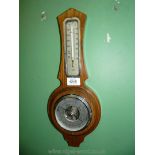 A Barometer/thermometer, 16" tall.