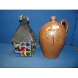 A stoneware flagon, 30 cm tall.