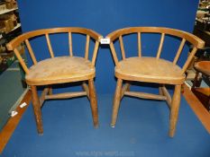 Two early 20th century wooden child's chapel chairs.