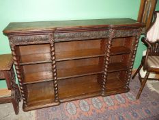 A 19th c. carved Oak bookcase with barley twist columns, label to base for Edmund Grundy, no.