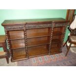 A 19th c. carved Oak bookcase with barley twist columns, label to base for Edmund Grundy, no.