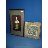 Two framed floral oriental embroideries.