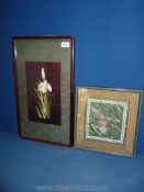 Two framed floral oriental embroideries.