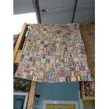 A single patchwork bed cover, some holes,