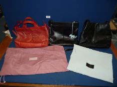 Two Radley leather handbags with Radley storage bags and a Oasis leather handbag.