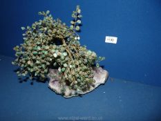 A Gemstone Bonsai tree on amethyst crystal base, 10'' tall.