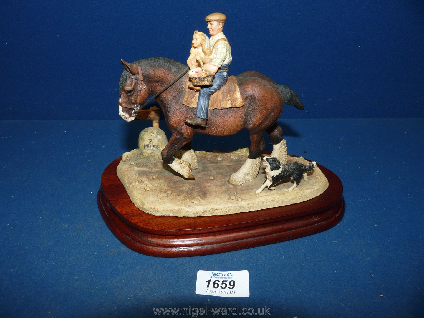 A Border Fine Arts 'Off to the Fair', 658 : A farmer and child on a brown horse, limited edition,