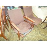 A 1960's design dark stained Teak framed low Armchair and a similar armless Chair