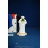 A Coalport 'The Snowman' figure; 'Snowman's Surprise', first edition with box.
