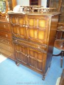 An Old Charm/Priory Oak style Oak Drinks Cabinet/Cupboard having a full width drawer,