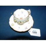A fine Meissen flower encrusted cup and saucer, mid 19th century in very good condition.