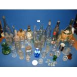 A quantity of miscellaneous bottles including lemonade bottle with marble stopper and Italian wine