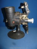 A Bell & Howell Filmo 57 model 16mm 110v film projector with Taylor & Hobson, circa 1934, 15'' tall.