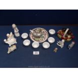 A quantity of china including small Lladro angel, crested ware, Wade whimsies, doll's teaset, etc.