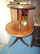 A good 19th century circular Mahogany two-tier Dumb Waiter standing on a turned column with three
