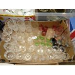 A quantity of glasses including four Freixenet black stemmed champagne glasses,