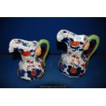 Two reproduction Imari style Ironstone jugs. 8 1/2" and 7" tall.