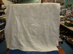 A lightweight double Throw in cream with crochet pattern